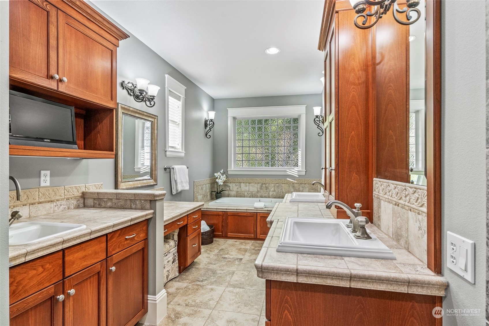 19501 Northwest Krieger Road Ridgefield, WA 98642 - Photo 16 of 38 a large kitchen with stainless steel appliances granite countertop a sink and a stove