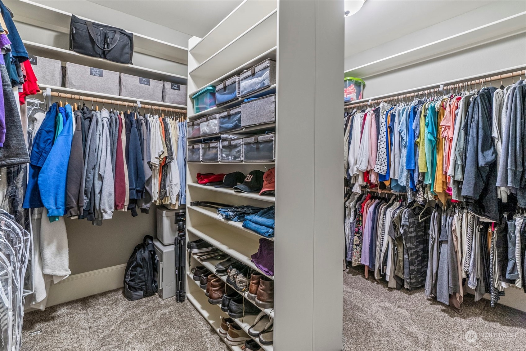 19501 Northwest Krieger Road Ridgefield, WA 98642 - Photo 19 of 38 a view of walk in closet with clothes and shoes