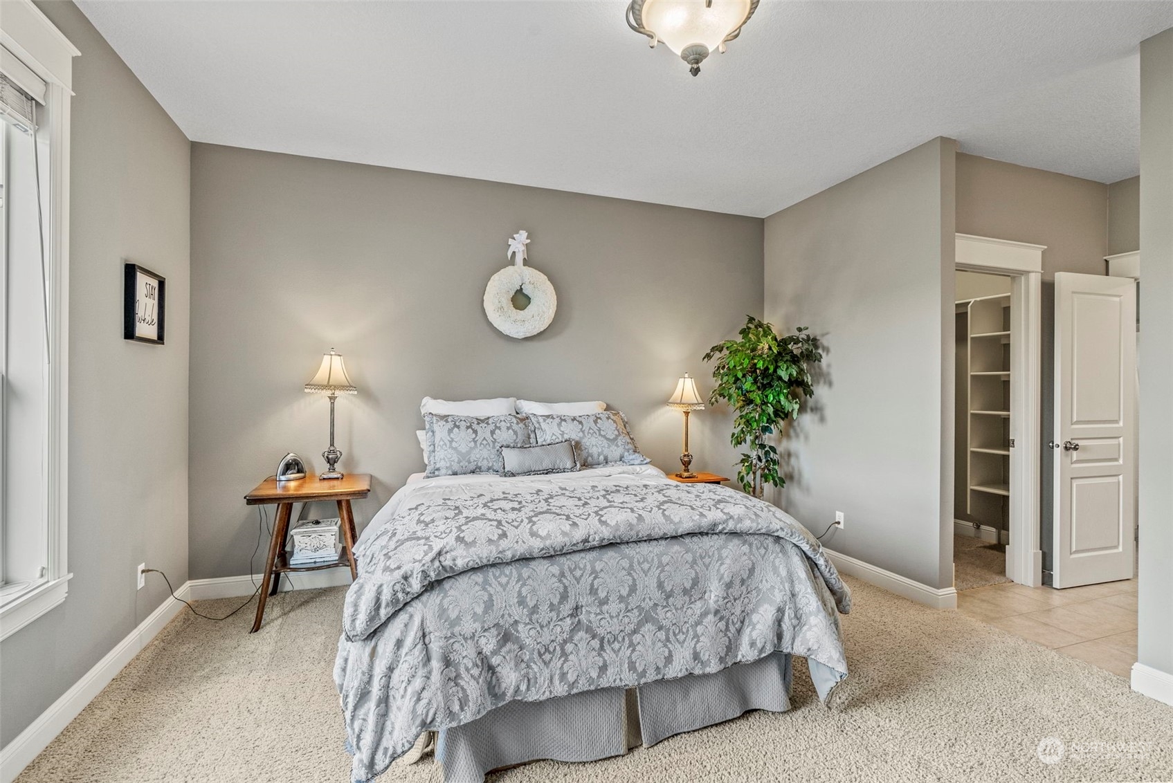 19501 Northwest Krieger Road Ridgefield, WA 98642 - Photo 20 of 38 a bedroom with bed and a window