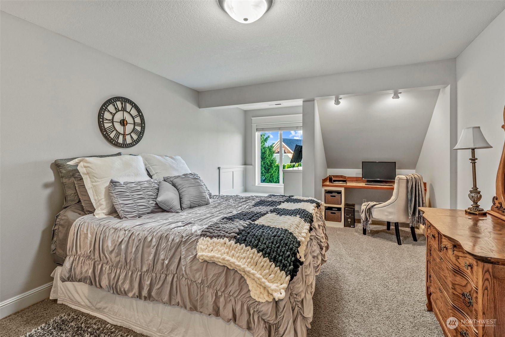 19501 Northwest Krieger Road Ridgefield, WA 98642 - Photo 27 of 38 a bedroom with a bed and a table
