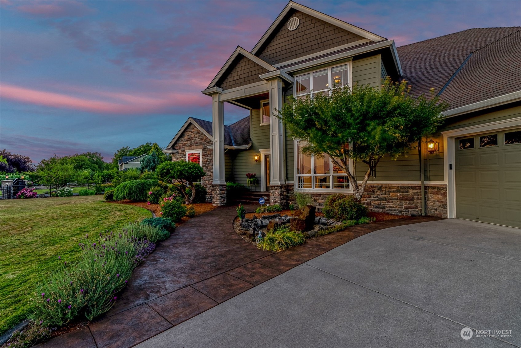 19501 Northwest Krieger Road Ridgefield, WA 98642 - Photo 3 of 38 a front view of a house with garden