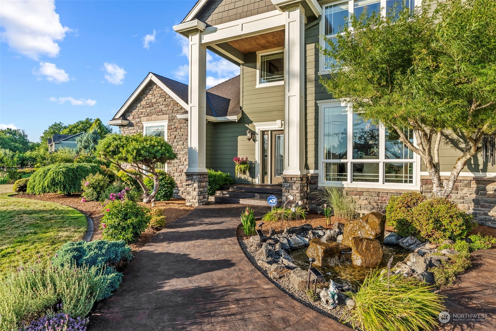 19501 Northwest Krieger Road Ridgefield, WA 98642 - Photo 4 of 38 a front view of a house with garden