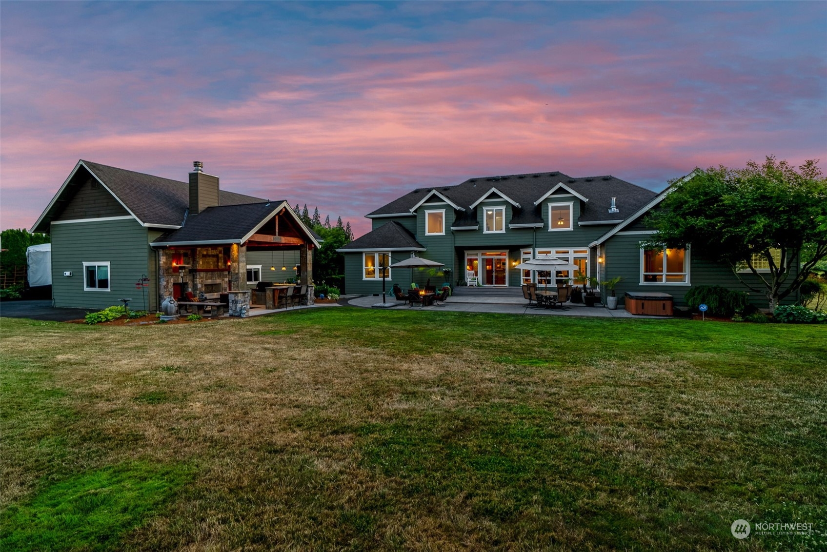 19501 Northwest Krieger Road Ridgefield, WA 98642 - Photo 5 of 38 a front view of house with an outdoor space and seating