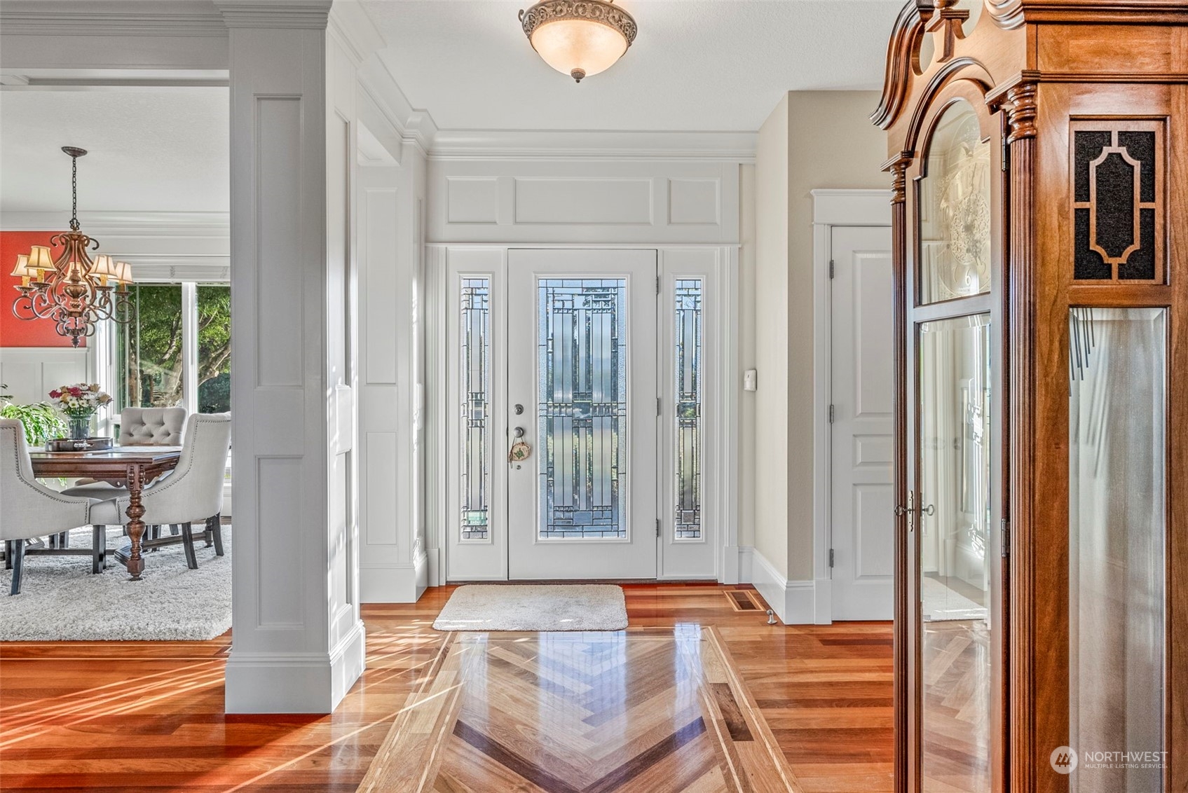 19501 Northwest Krieger Road Ridgefield, WA 98642 - Photo 7 of 38 a view of a bedroom with a bed and glass door