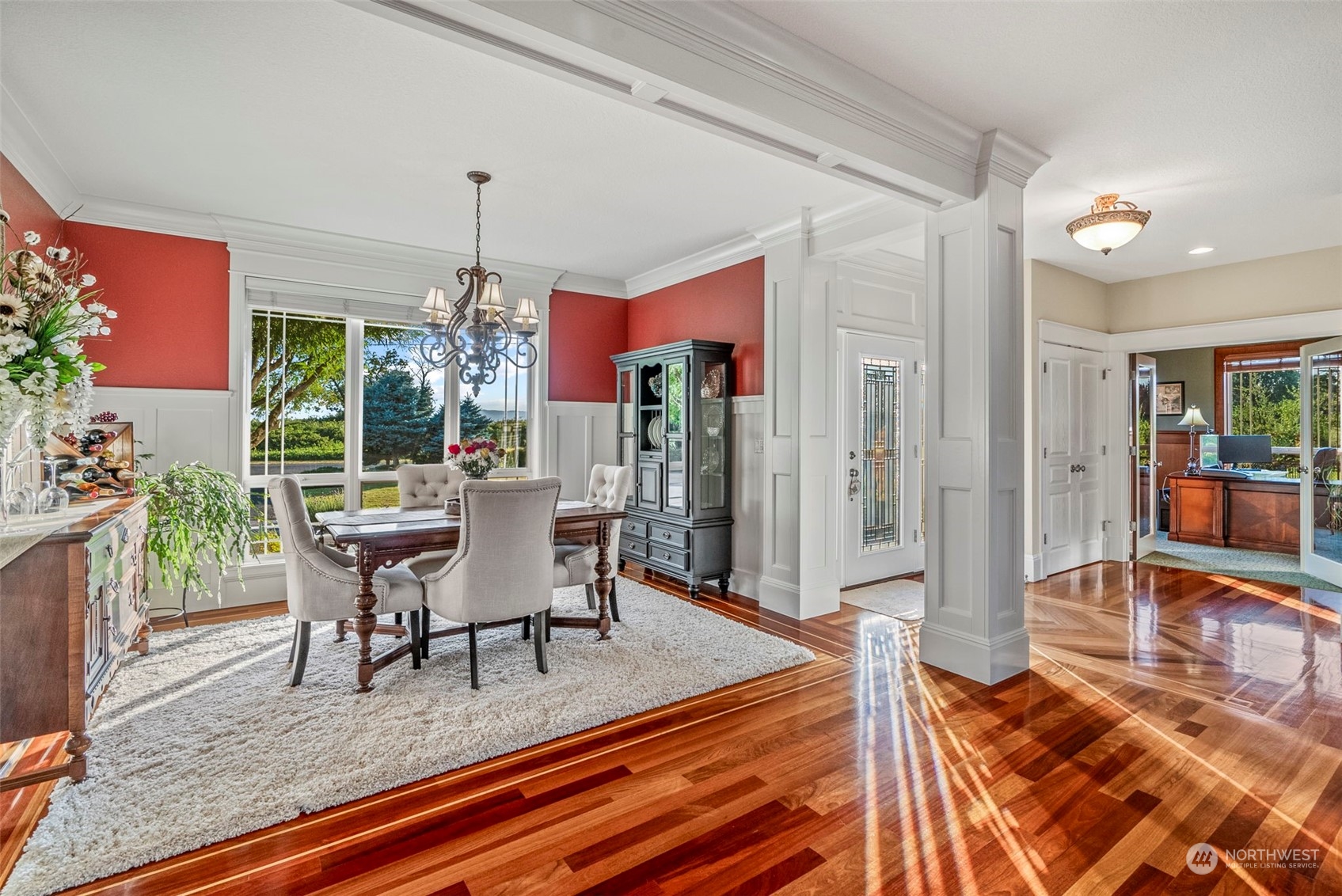 19501 Northwest Krieger Road Ridgefield, WA 98642 - Photo 8 of 38 a view of a dining room with furniture window and wooden floor