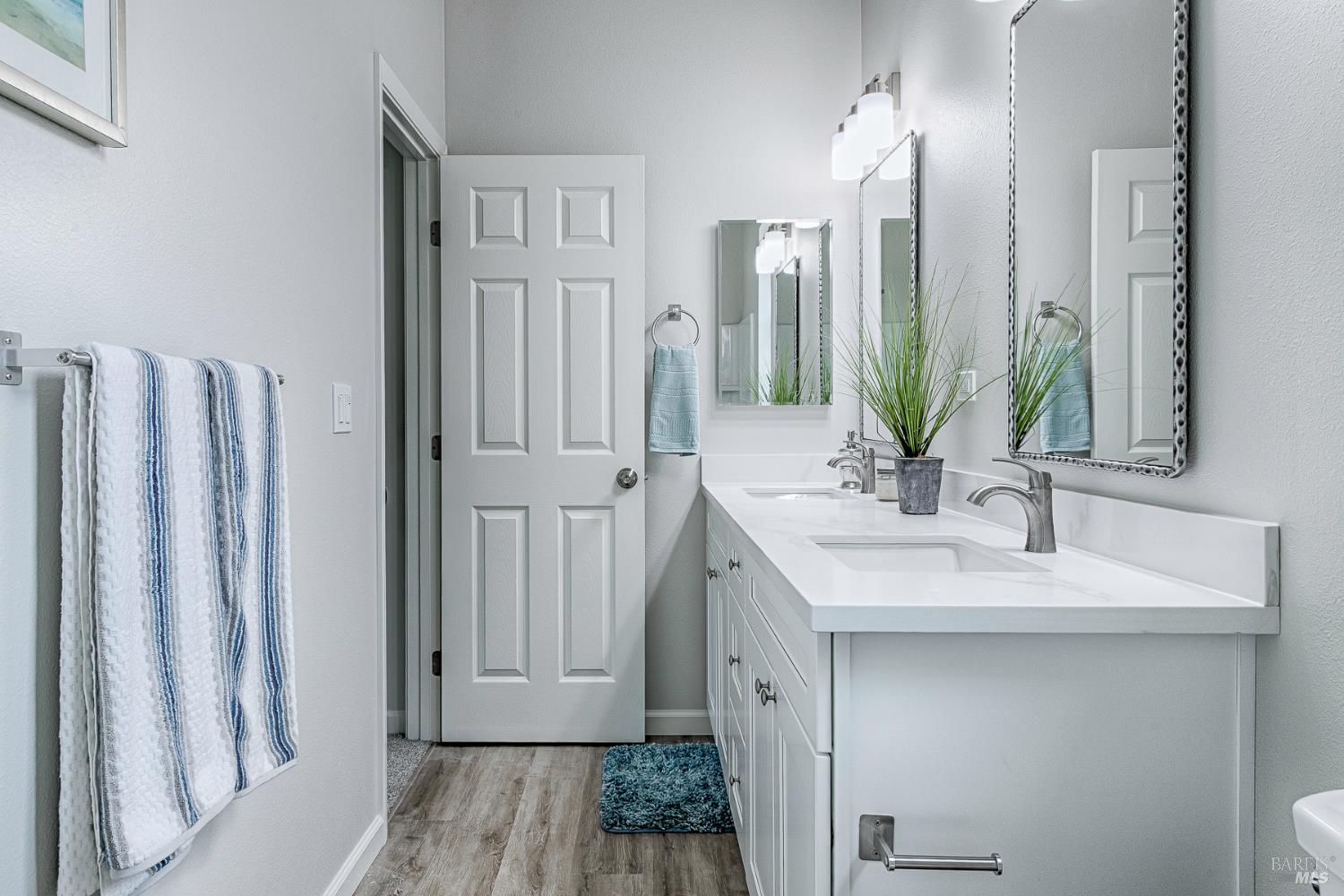 1964 Las Ventanas Drive Santa Rosa, CA 95407 - Photo 29 of 36 a bathroom with a sink a mirror and a shower