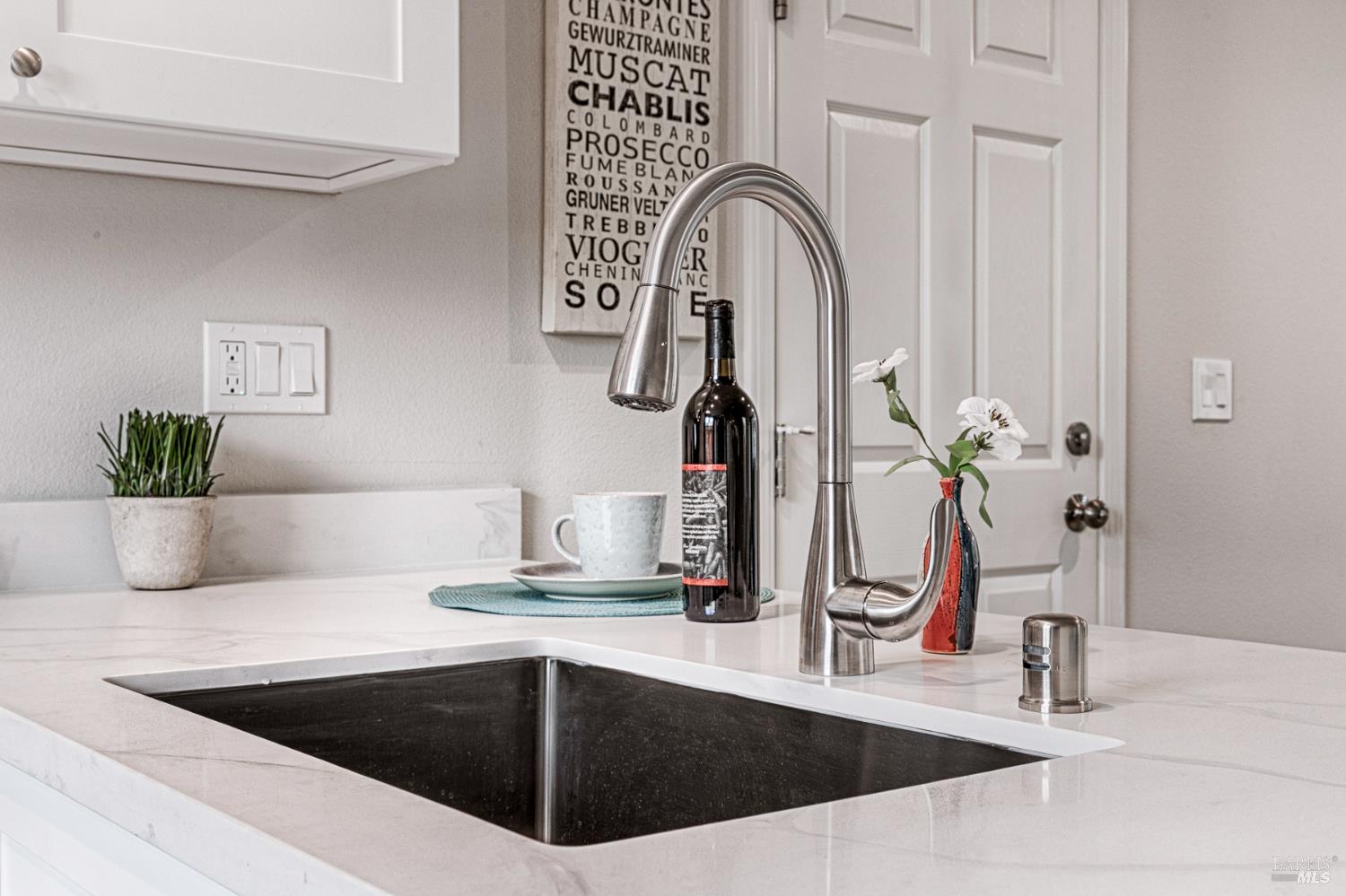 1964 Las Ventanas Drive Santa Rosa, CA 95407 - Photo 9 of 36 a kitchen counter with sink and potted plant