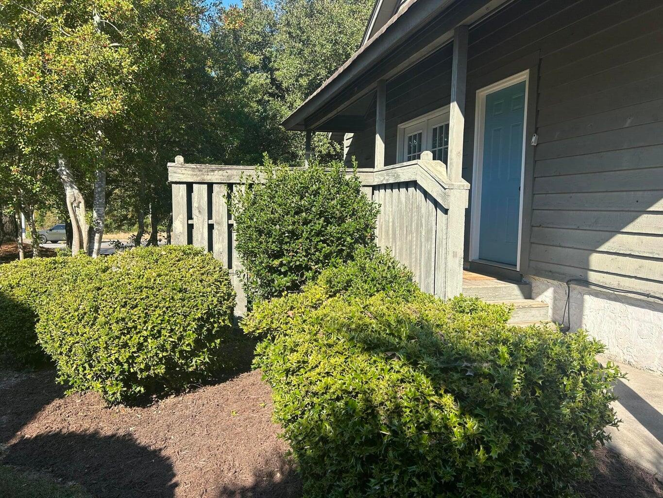 9 The Corners Aiken, SC 29803 - Photo 6 of 34 Side Yard & Front Door
