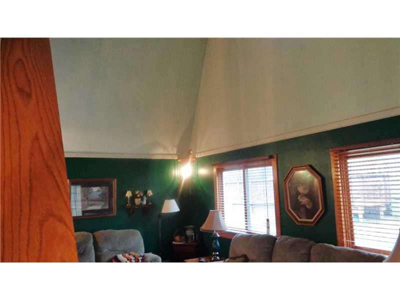 650 Ridge Road Georgetown, PA 15043 - Photo 2 of 17 Living Room. Large, inviting Living Room, with French Doors to Exterior. Soaring Ceiling. Paddle Fan. Wall-to-wall Carpeting. Stairs up to Master Bedroom.
