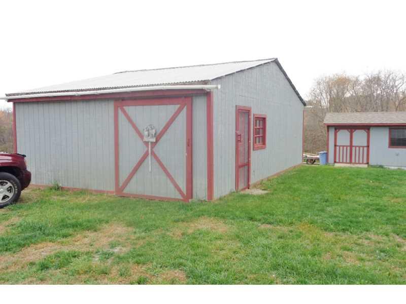 650 Ridge Road Georgetown, PA 15043 - Photo 14 of 17 Stable/Barn. Stable has Two Stalls, could be Three. Plenty of room for Grain, etc. Storage. High Barn Door. Has Electric and Water.