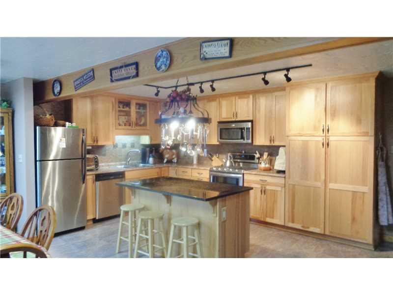 650 Ridge Road Georgetown, PA 15043 - Photo 4 of 17 Kitchen. Every Chef s Dream! Hickory Cabinets with Pull-Out Drawers and Soft-Close Doors, Stainless Appliances and Sink, Tile Floor, Prep Island with Granite Top, Good Lighting. Could Host a huge amount of Family and Friends.