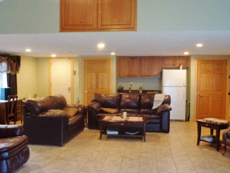 650 Ridge Road Georgetown, PA 15043 - Photo 10 of 17 Family Room. Could hold lots of Family and Friends in this Family Room. Gas Fireplace, Kitchen Cabinets for Party Prep, Large Storage Closet, Door to Garage. Pull-Down steps to Above Storage. Paddle Fan. Pitched Ceiling.
