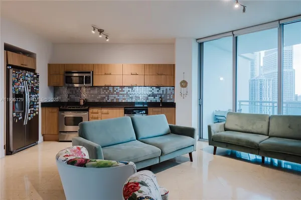 a living room with furniture and a couch