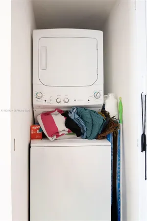 a utility room with washer and dryer