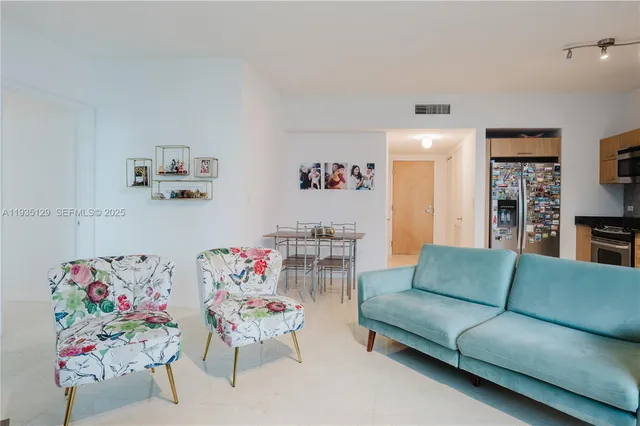 a living room with furniture and a couch