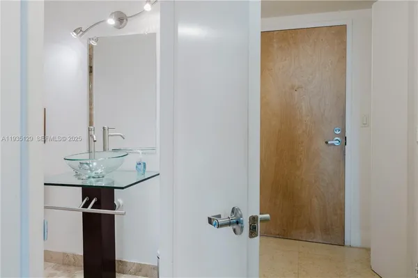 a sink with a mirror