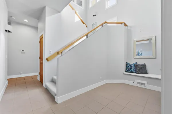 a view of a hallway view with staircase