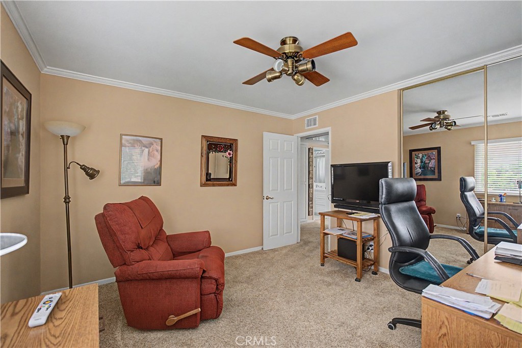 22671 Town Crier Road Calabasas, CA 91302 - Photo 33 of 35 a workspace with a couch and a window