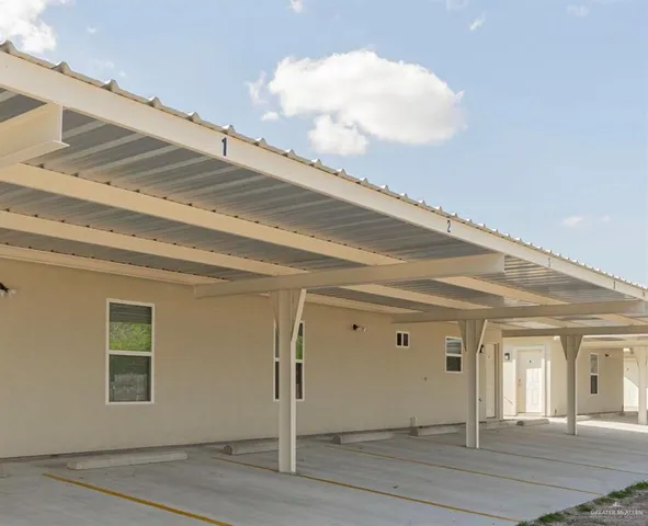 a view of a hallway with entryway