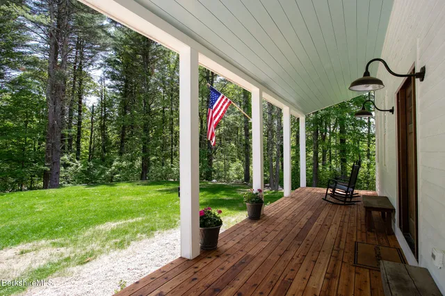 a view of a living room and entry way