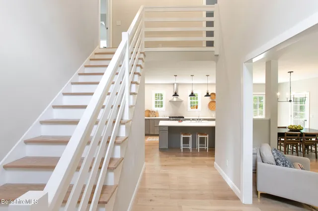 a kitchen with a table and chairs in it