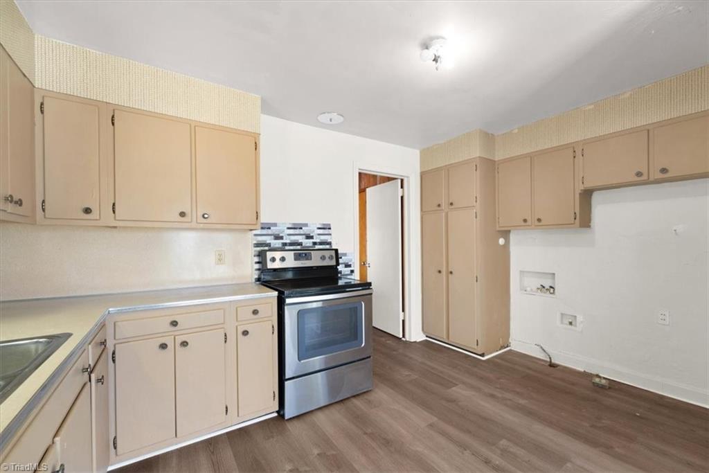 1130 Tabor Street High Point, NC 27262 - Photo 7 of 19 Hardworking kitchen with lots of cabinetry and counter space!