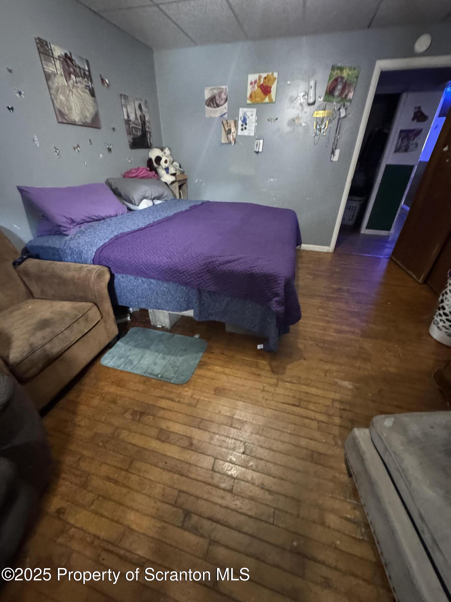 47 Broad Street New Milford, PA 18834 - Photo 25 of 65 a bedroom with furniture and a bed