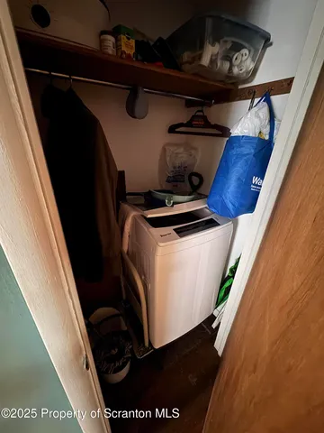 a bathroom with a toilet and a sink