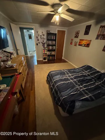 a kitchen with a sink a stove a refrigerator and cabinets