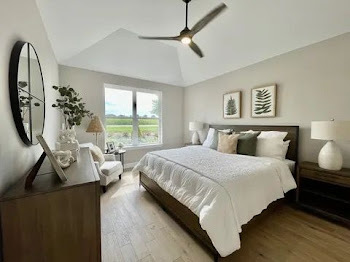 T3 15929 Prairie View Lockport, IL 60441 - Photo 20 of 27 a large bed sitting in a bedroom next to a window