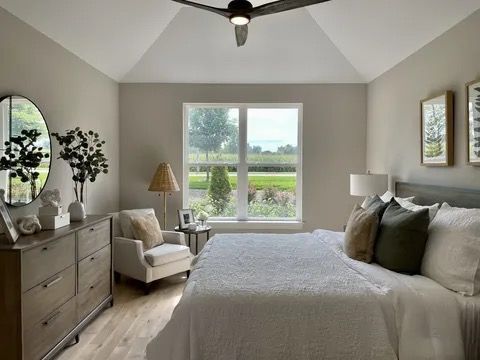 T3 15929 Prairie View Lockport, IL 60441 - Photo 21 of 27 a bedroom with a bed and a couch