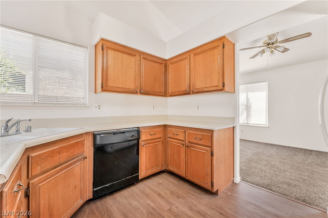 4904 Spring Falls Way North Las Vegas, NV 89031 - Photo 10 of 24 Functional kitchen with ample cabinetry and a clean aesthetic.