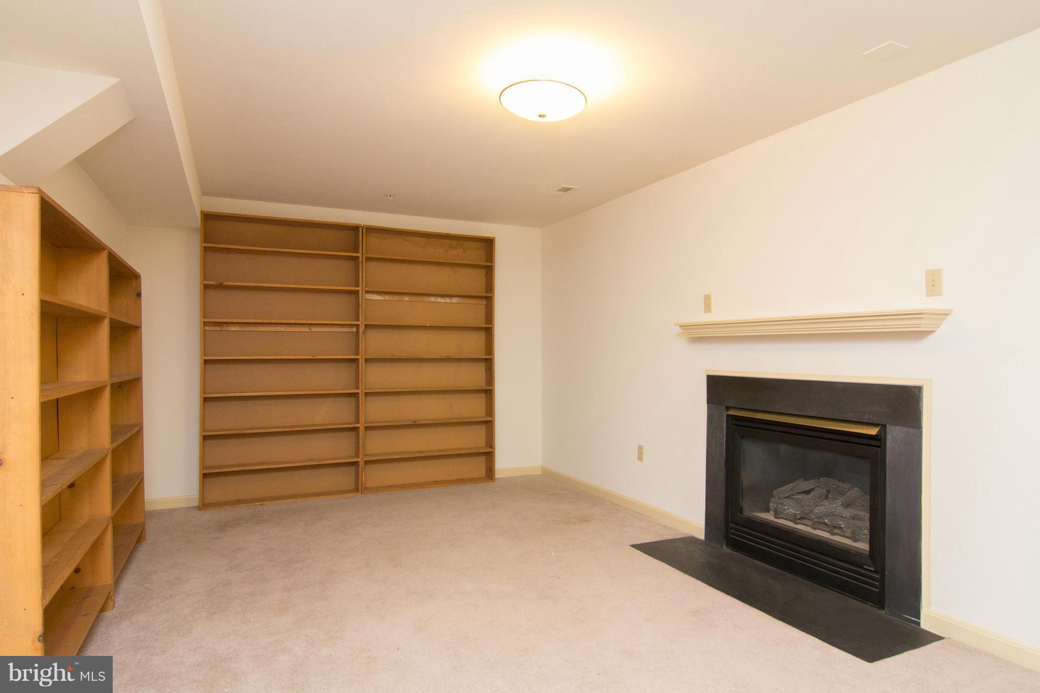 2235 Village Square Road Frederick, MD 21701 - Photo 15 of 30 LOWER LVL FR WITH GAS FIREPLACE