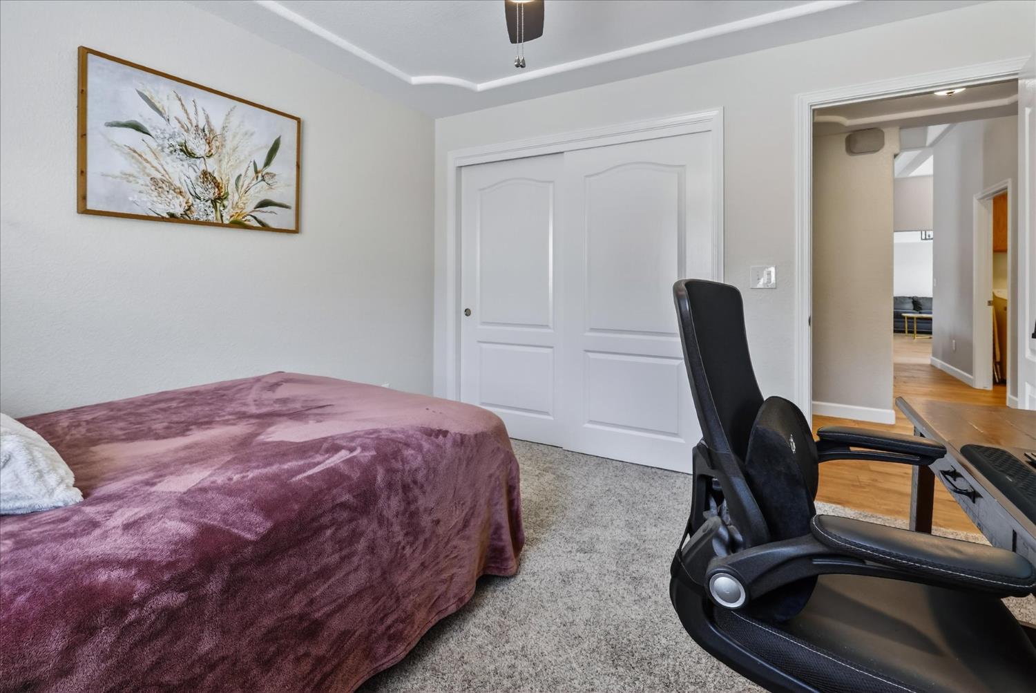 47482 Veater Ranch Road Coarsegold, CA 93614 - Photo 36 of 51 a bedroom with a bed and a chair