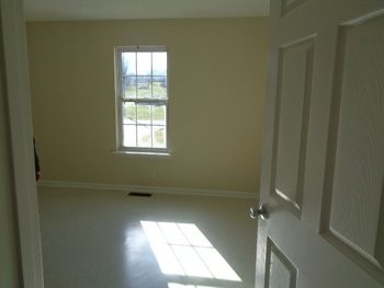 102 Tennessee Avenue Oak Grove, KY 42262 - Photo 5 of 7 a view of an empty room and window