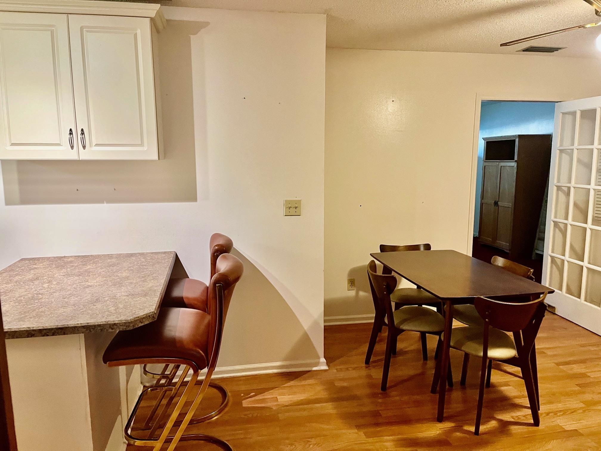 60 Palmer Street St. Augustine, FL 32084 - Photo 10 of 26 a view of a workspace with furniture and wooden floor