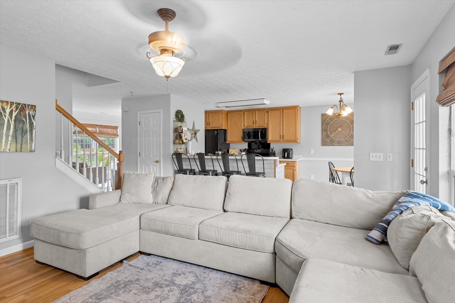 406 Orchid Road Franklin, TN 37064 - Photo 11 of 52 a living room with furniture and a chandelier