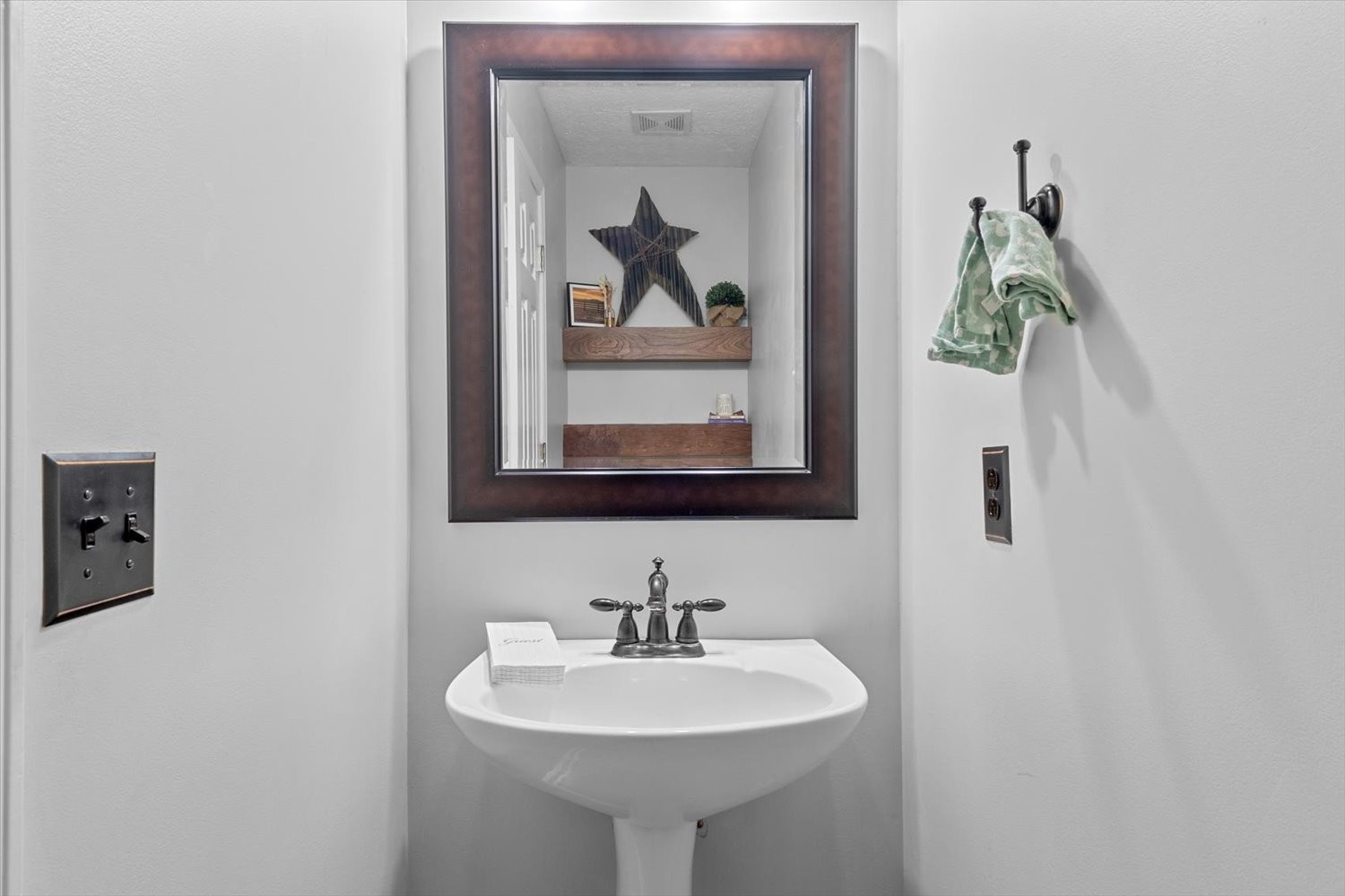 406 Orchid Road Franklin, TN 37064 - Photo 13 of 52 a bathroom with a sink and a mirror