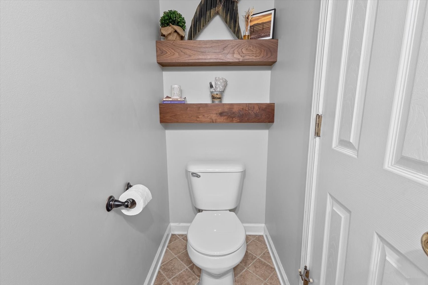 406 Orchid Road Franklin, TN 37064 - Photo 14 of 52 a bathroom with a toilet and a sink