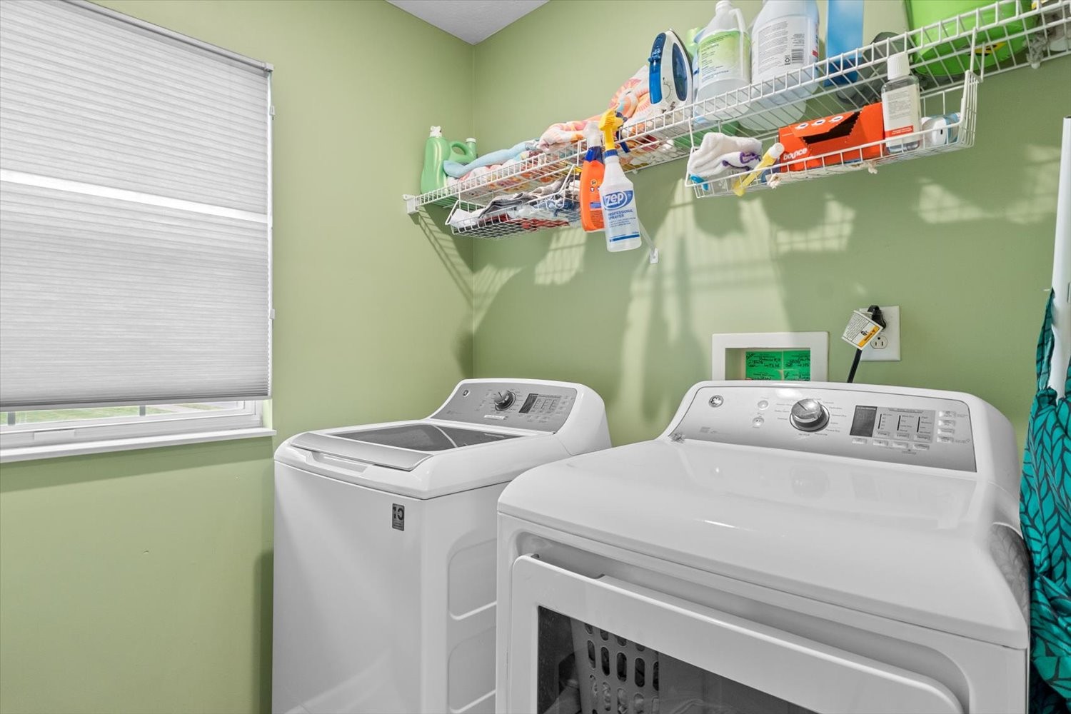 406 Orchid Road Franklin, TN 37064 - Photo 15 of 52 a utility room with dryer and washer