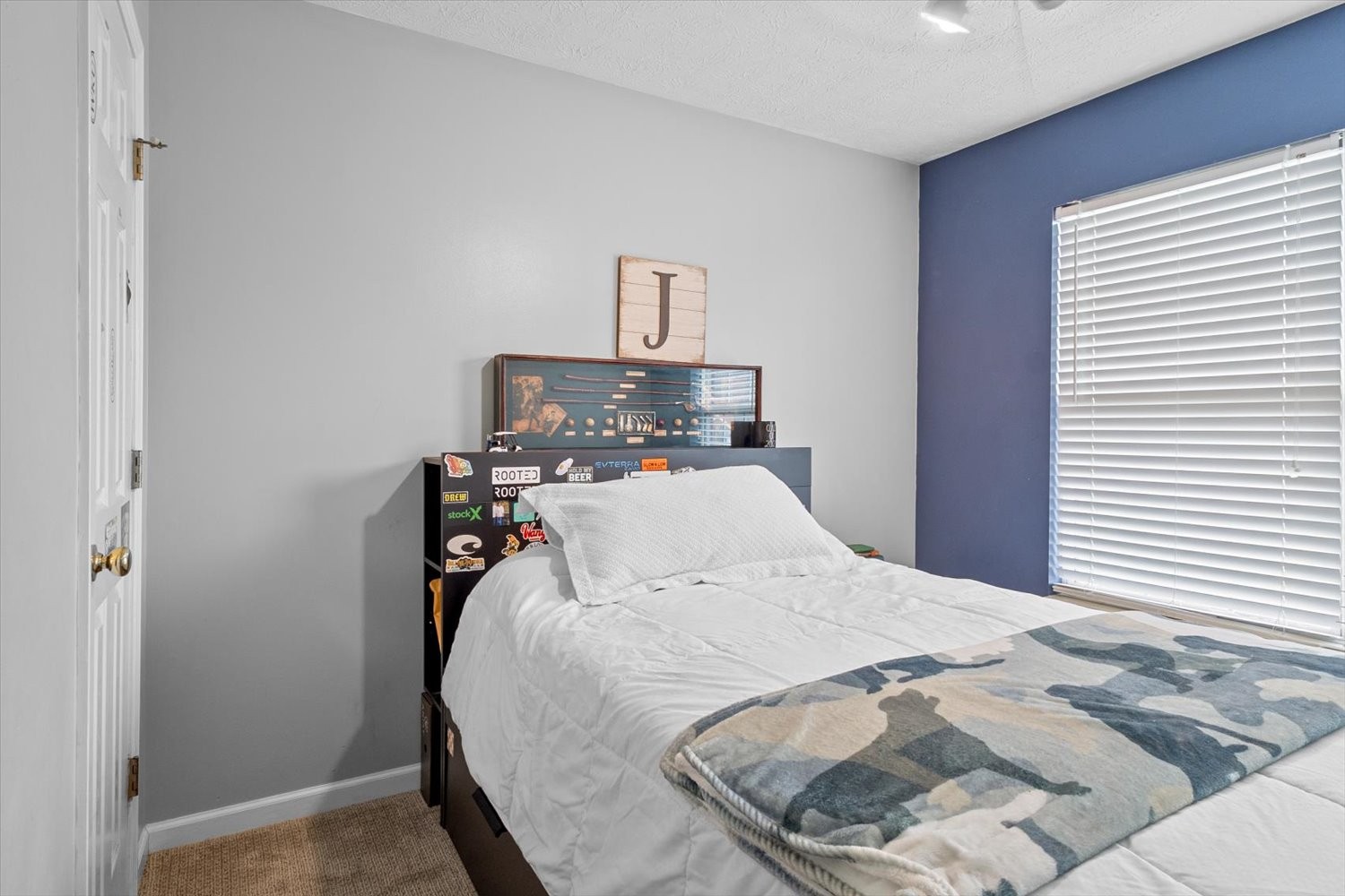 406 Orchid Road Franklin, TN 37064 - Photo 20 of 52 a bed sitting in a bedroom next to a window