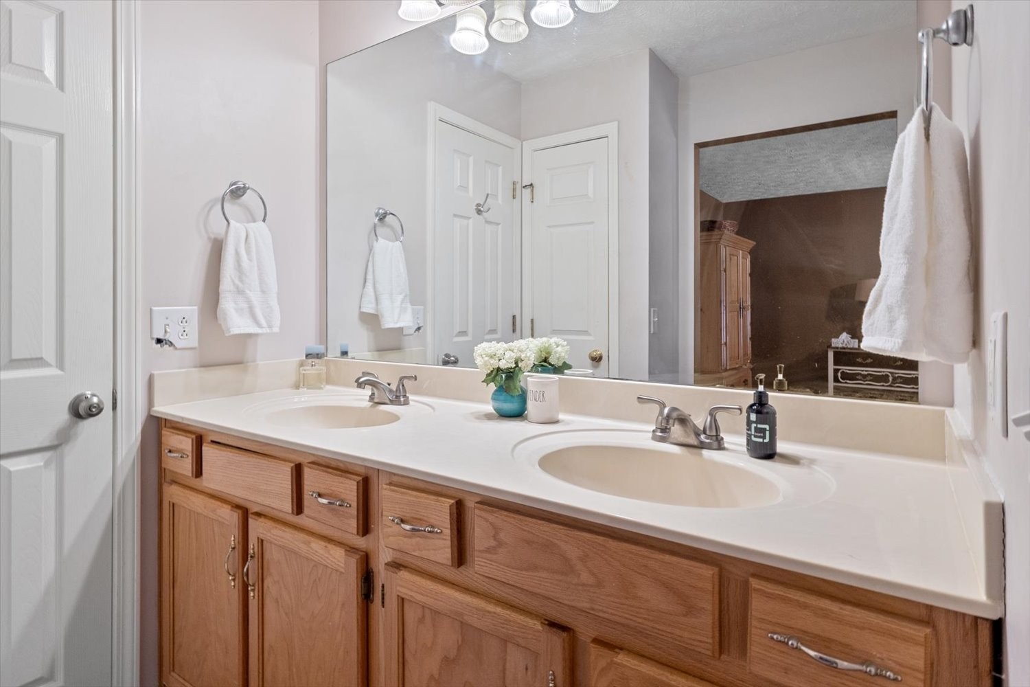 406 Orchid Road Franklin, TN 37064 - Photo 26 of 52 a bathroom with double vanity sinks and a mirror