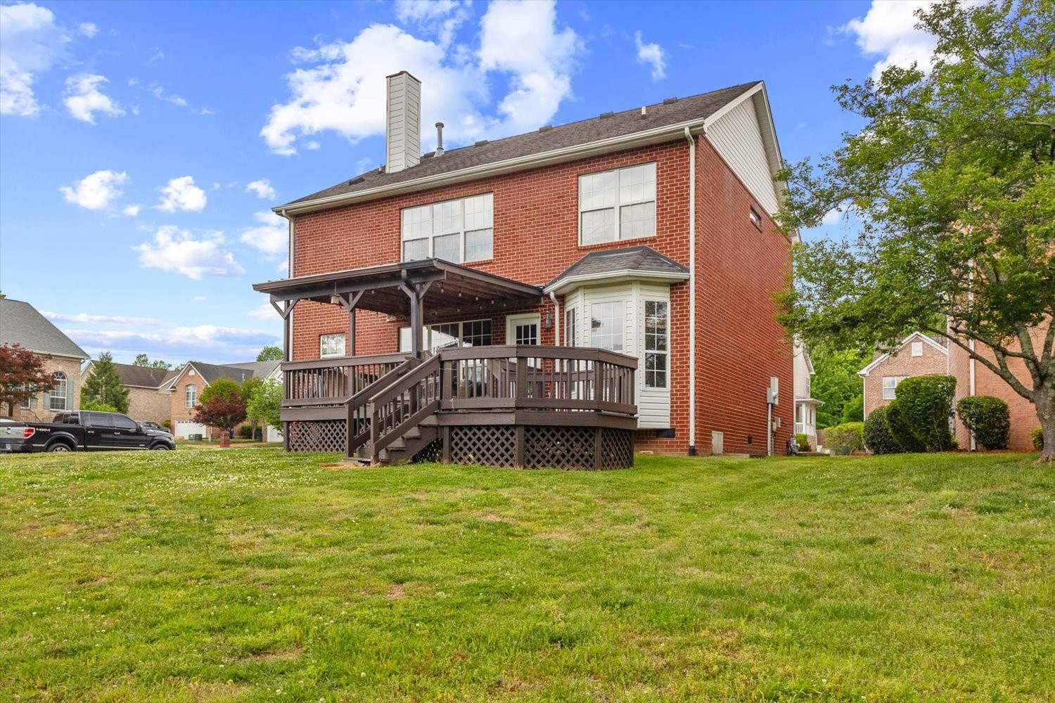 406 Orchid Road Franklin, TN 37064 - Photo 33 of 52 a house view with a sitting space and garden