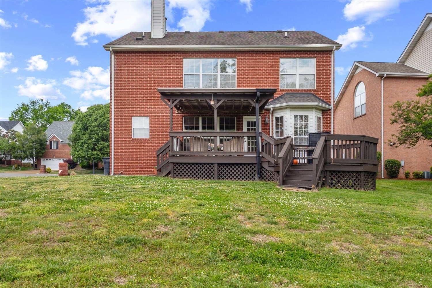 406 Orchid Road Franklin, TN 37064 - Photo 35 of 52 a view of a house with backyard porch and sitting area
