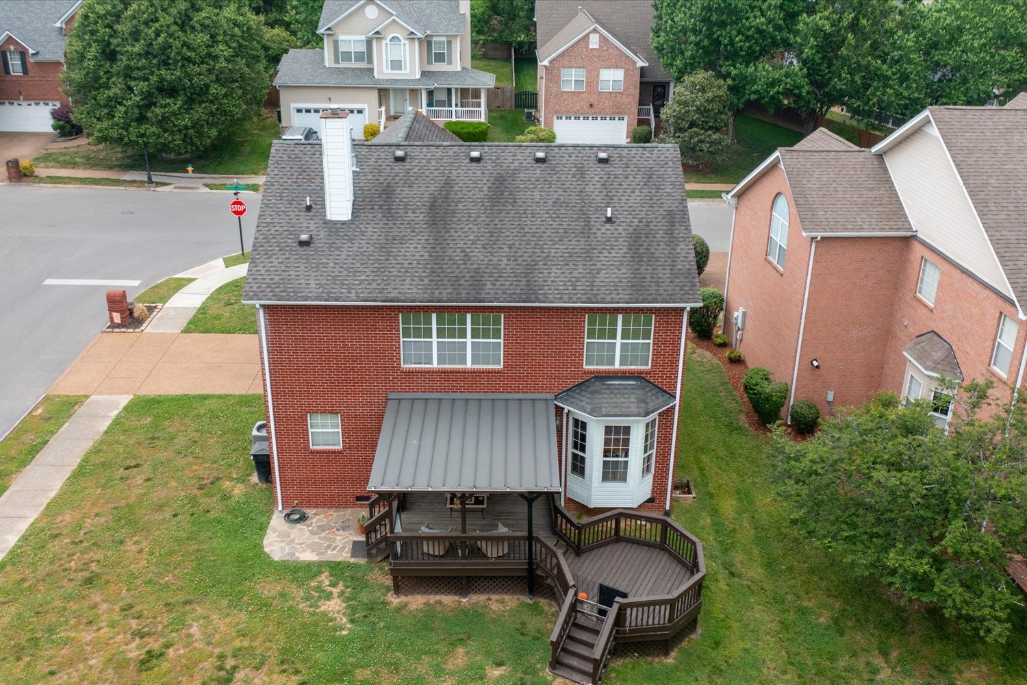 406 Orchid Road Franklin, TN 37064 - Photo 41 of 52 an aerial view of a house with garden space and street view