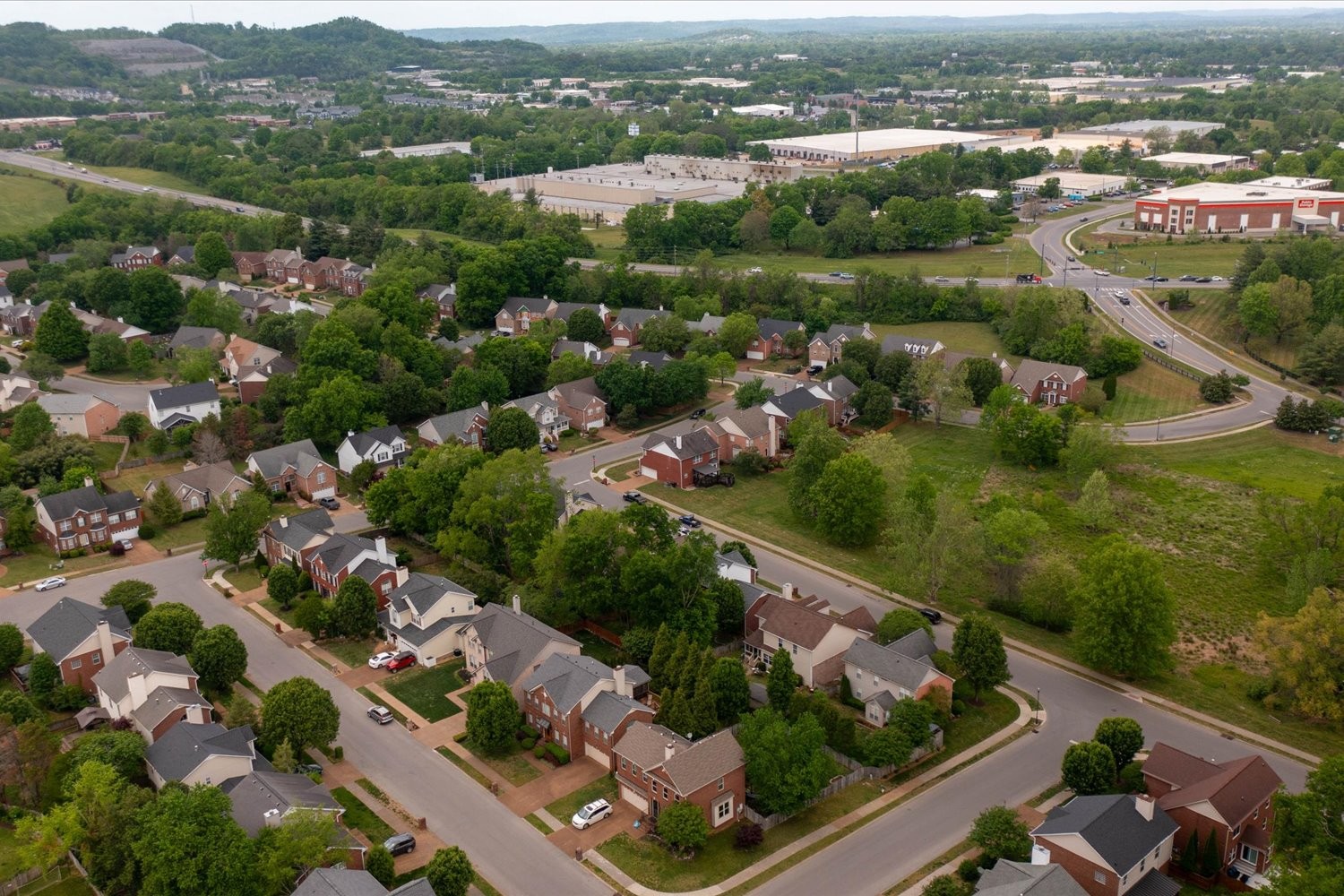 406 Orchid Road Franklin, TN 37064 - Photo 47 of 52 an aerial view of a city with mountains