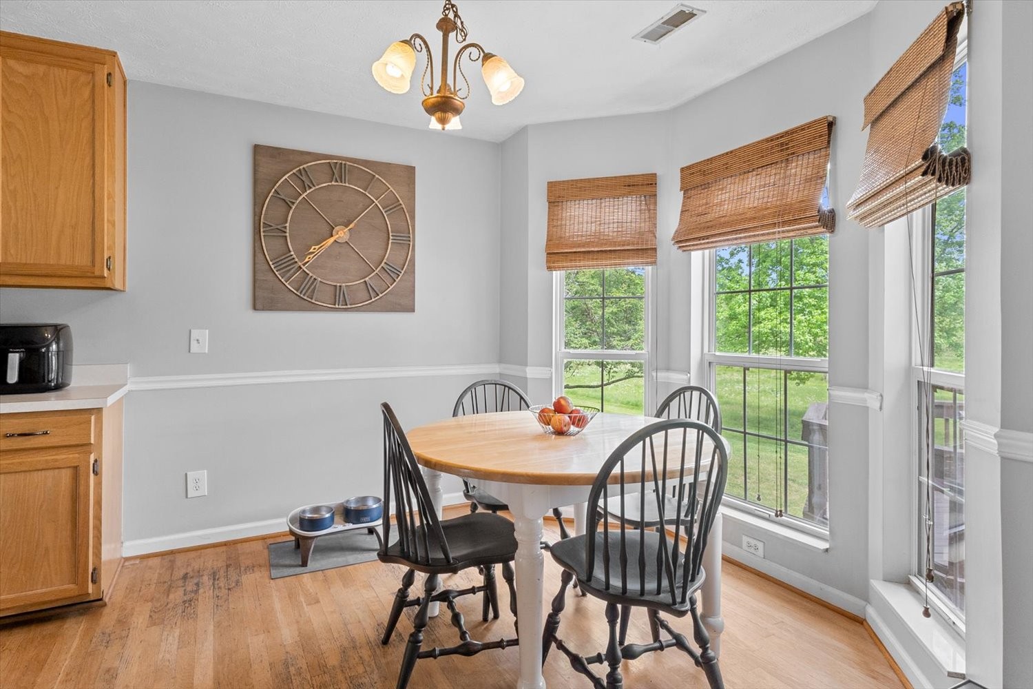 406 Orchid Road Franklin, TN 37064 - Photo 9 of 52 a view of a dining room with furniture window and wooden floor