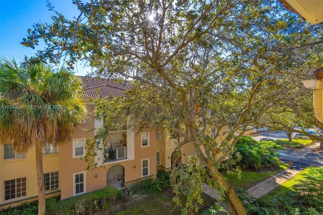a view of the house with a tree