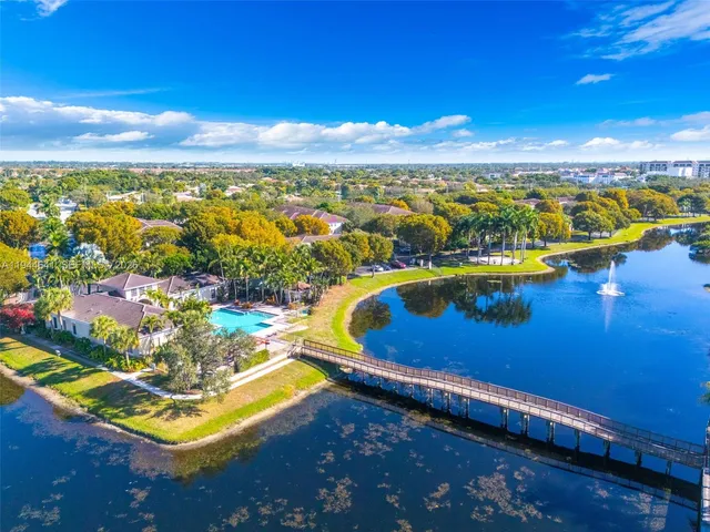 a view of a lake with a city