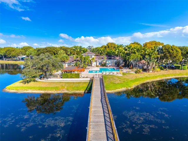 a view of a swimming pool with an ocean view